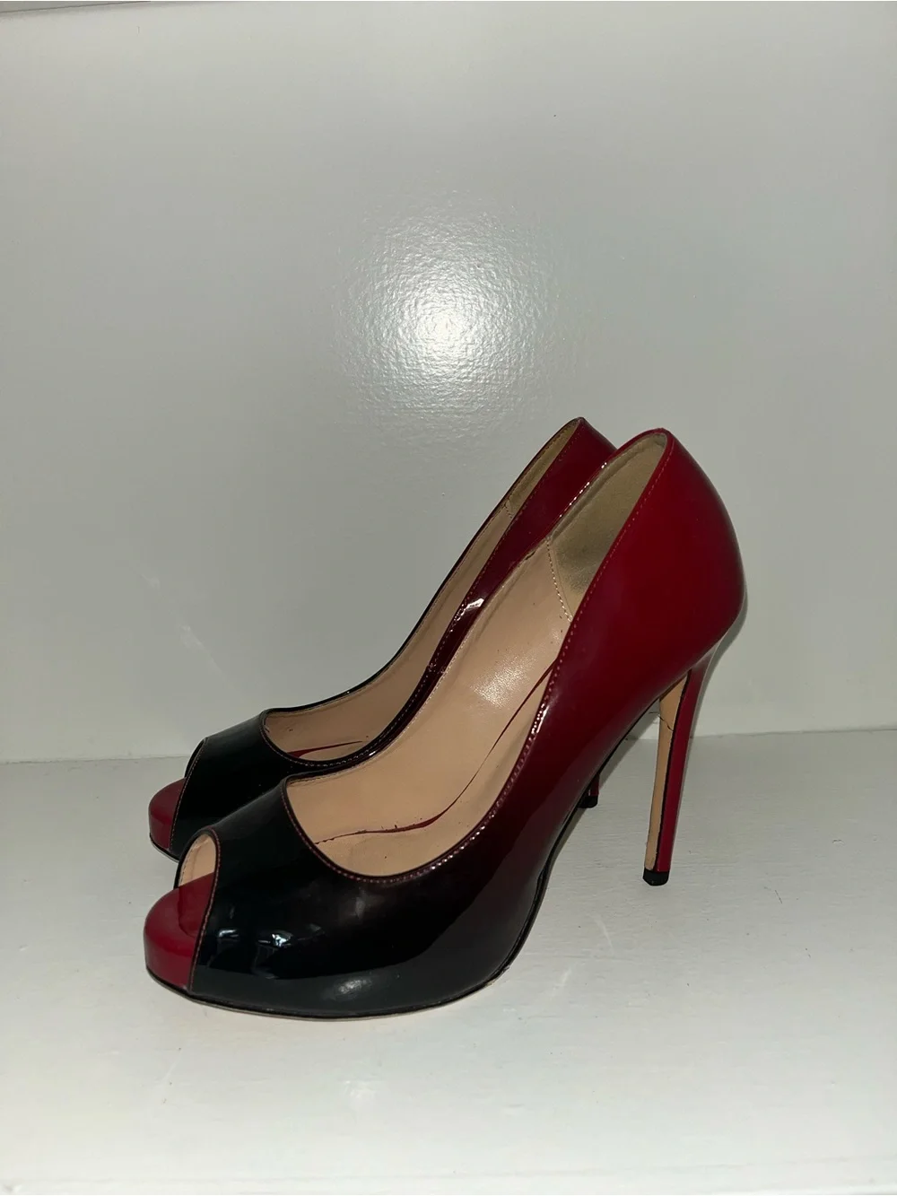 Red and black ombré covered platform peep toe pumps